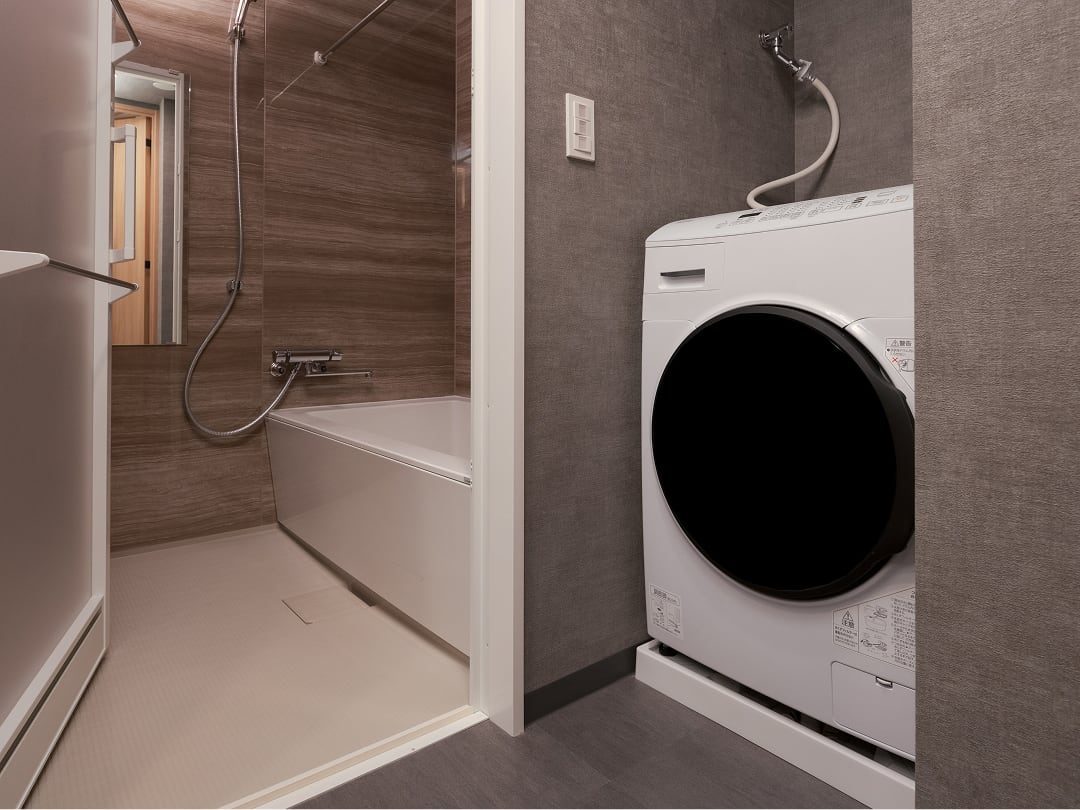 MIMARU SUITES 東京日本橋 客房內洗衣烘乾機，行李少帶一半